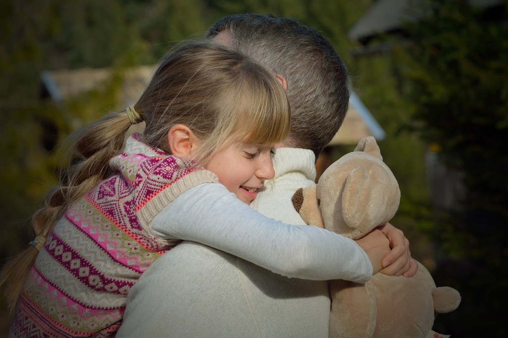 A father and daughter enjoy a hug. Pic credit below (pic 2)