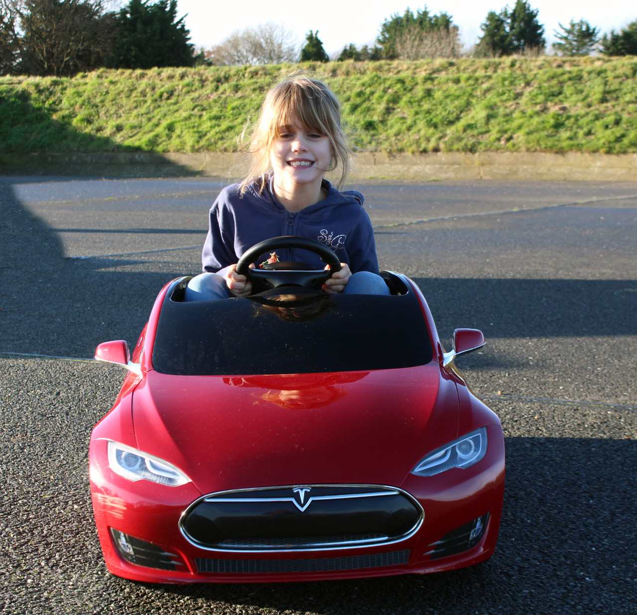 tesla ride on car