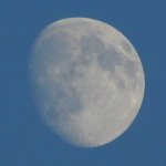 A waxing moon in the early evening
