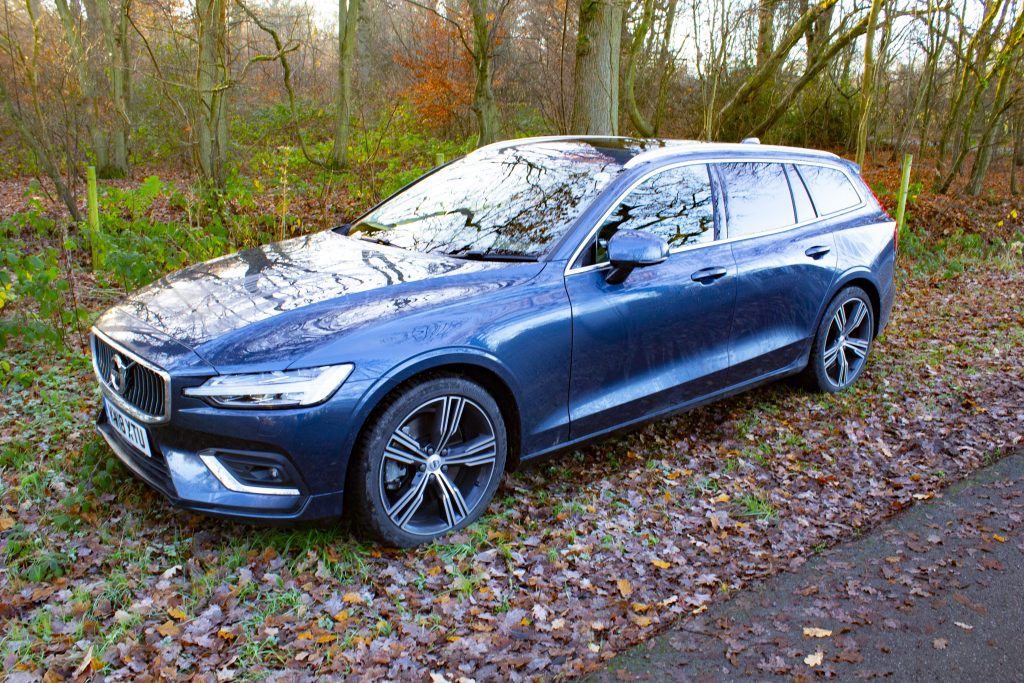 Volvo V60 D4 parks on the verge of a country lane.