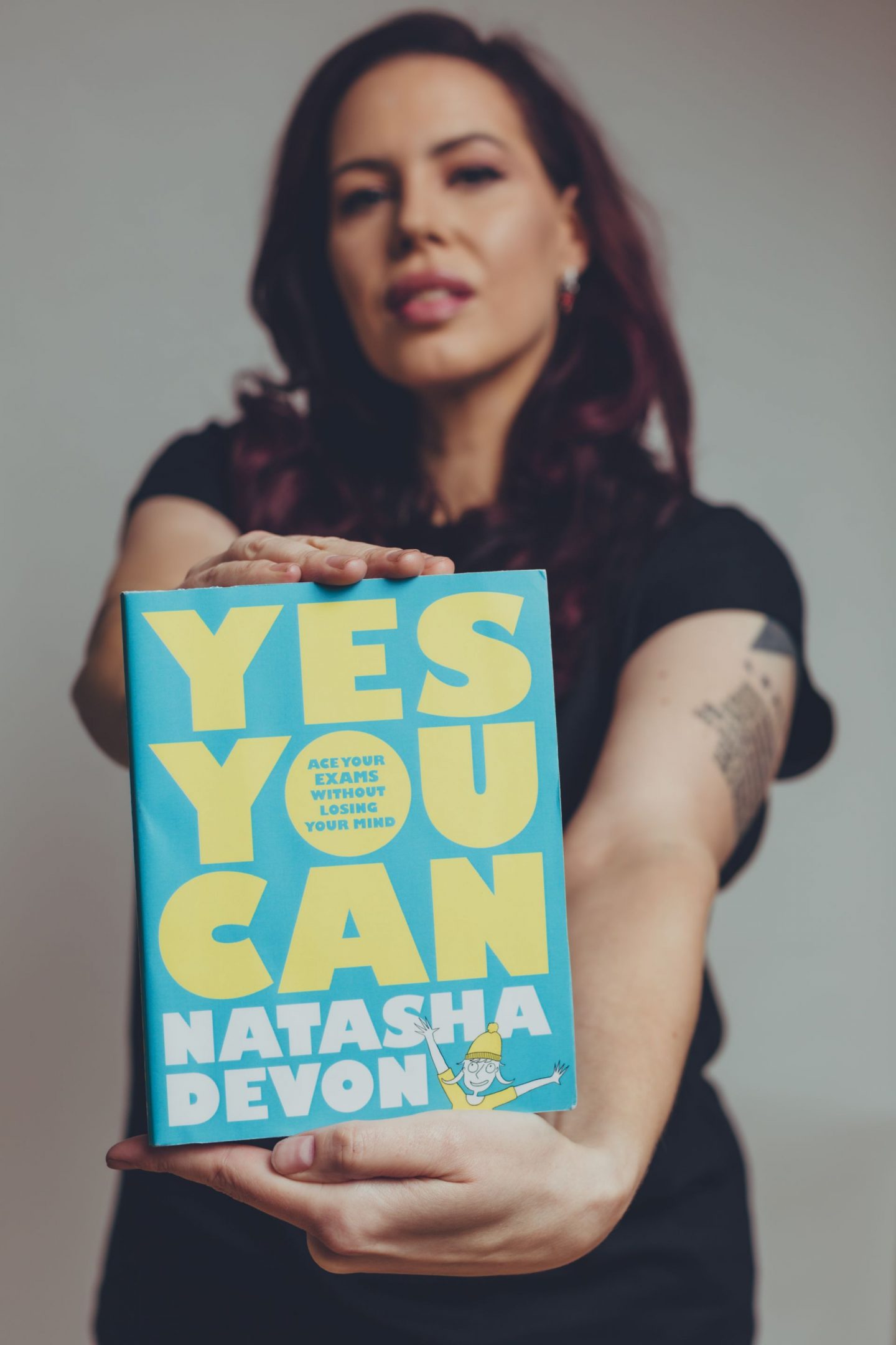 Natasha Devon with her book, Yes you Can Ace Your Exams Without Losing Your Mind