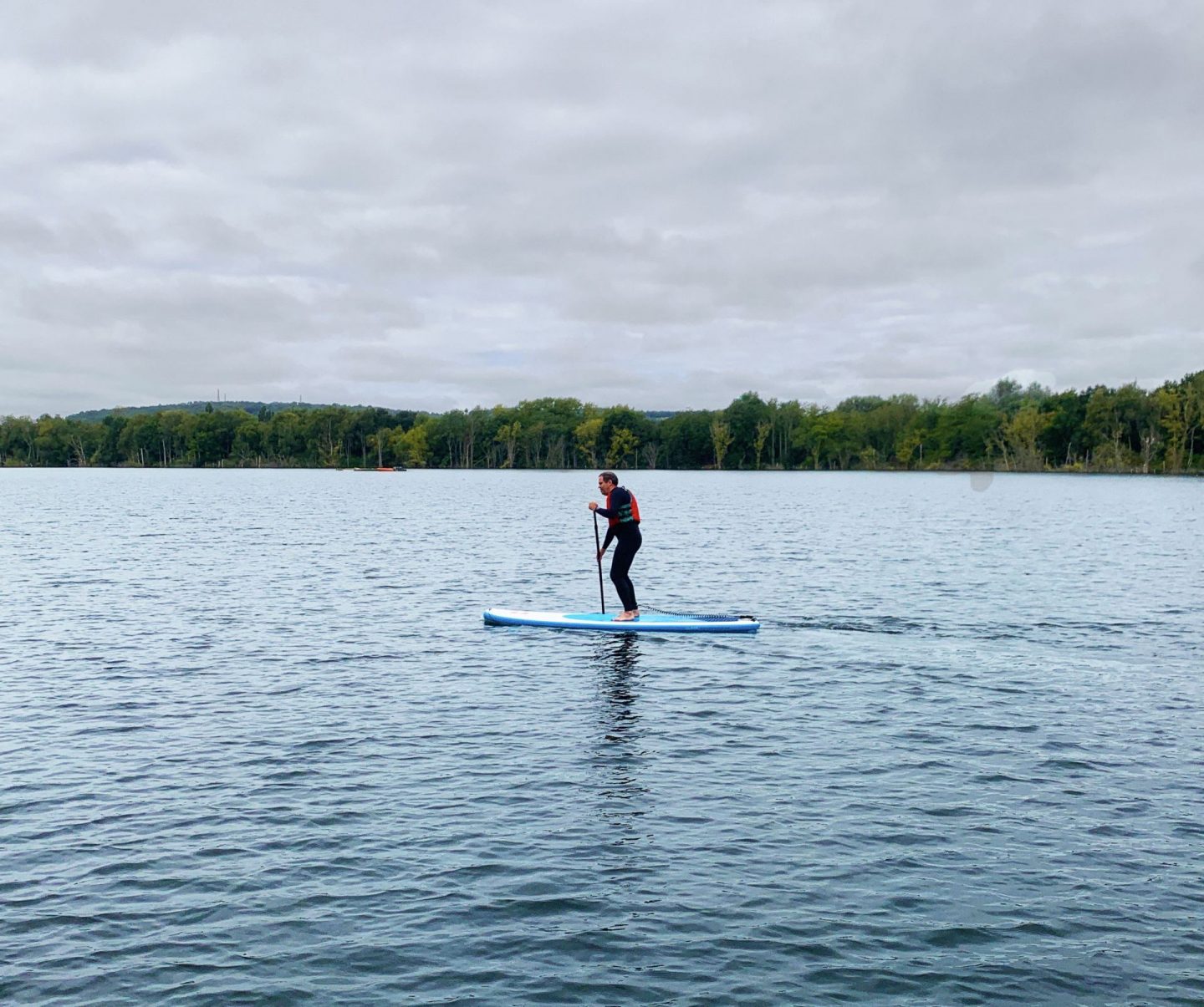 John Adams of Dadbloguk using a SUP  or stand up paddleboard