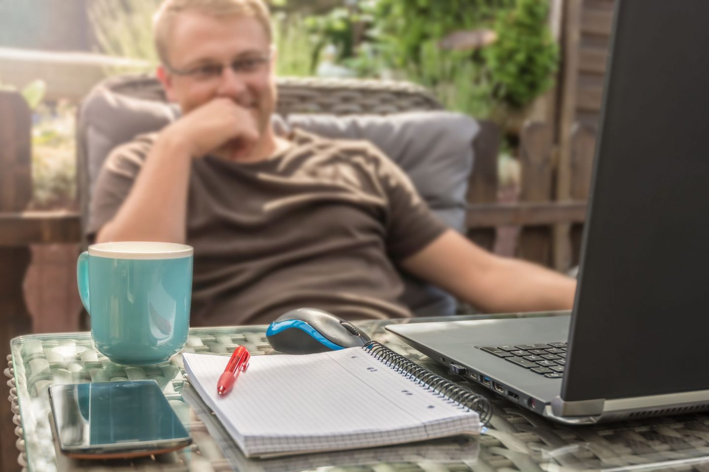 Flexible working during COVID-19. Image of a man working from home.