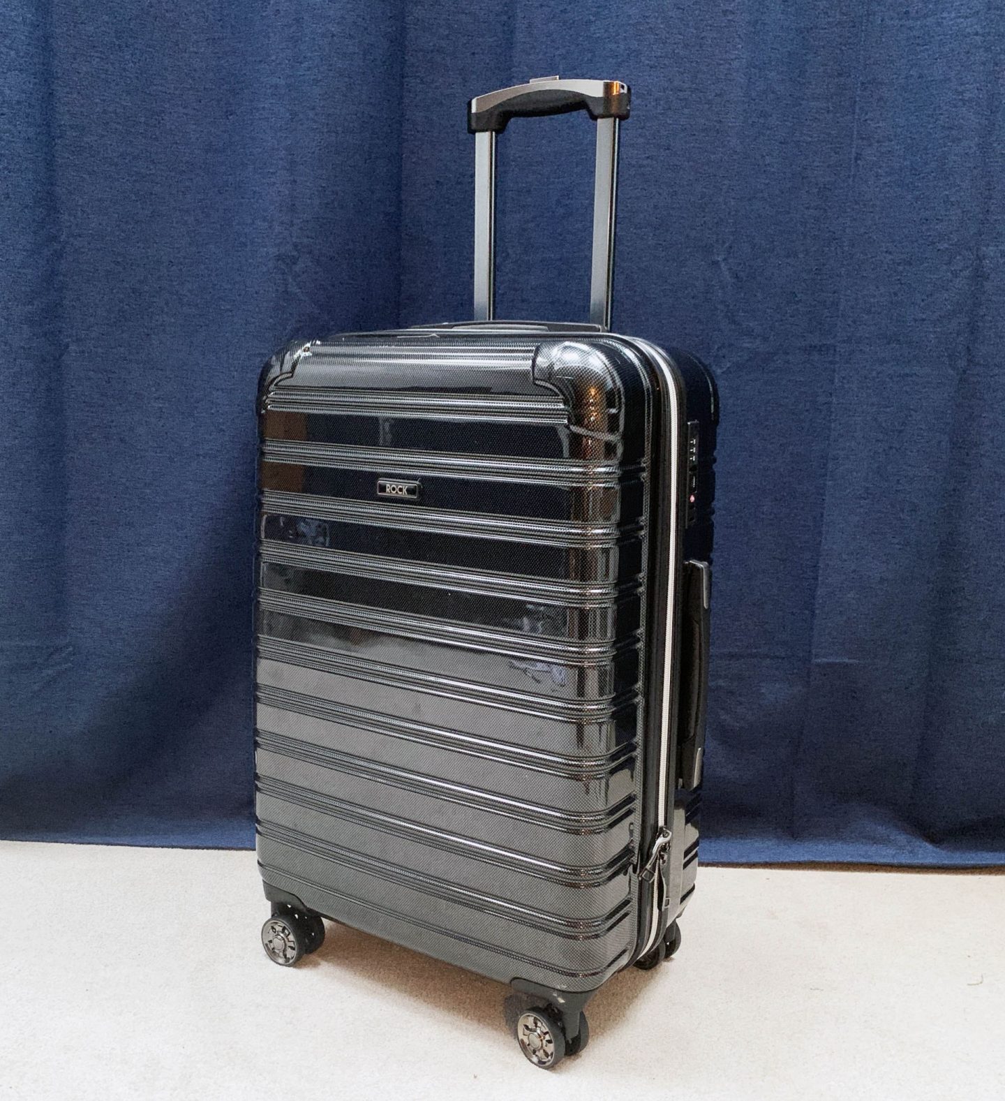 Hard shell suitcase.