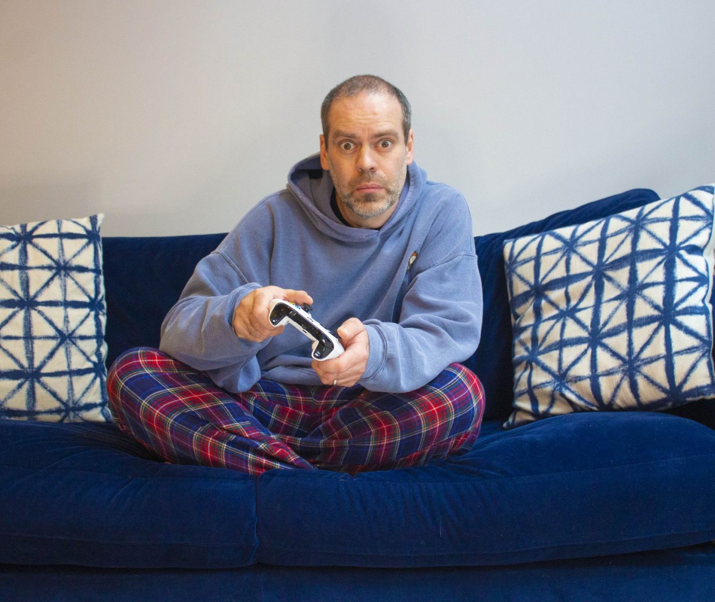 Man with no motivation sat on a sofa