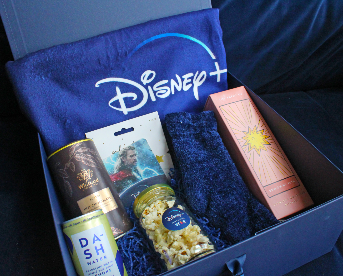 Disney+ gift box celebrating Star coming to the platform