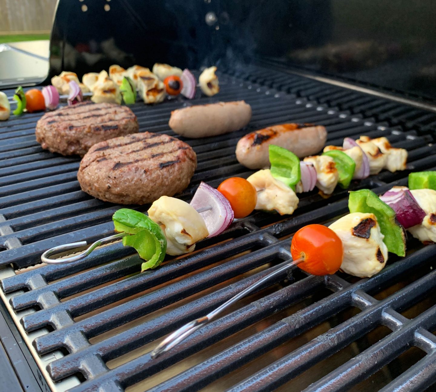 Food cooking on a gas grill