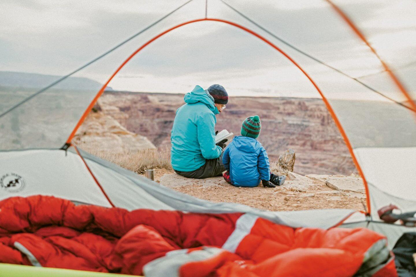 Parent and child camping in The Camping Life book