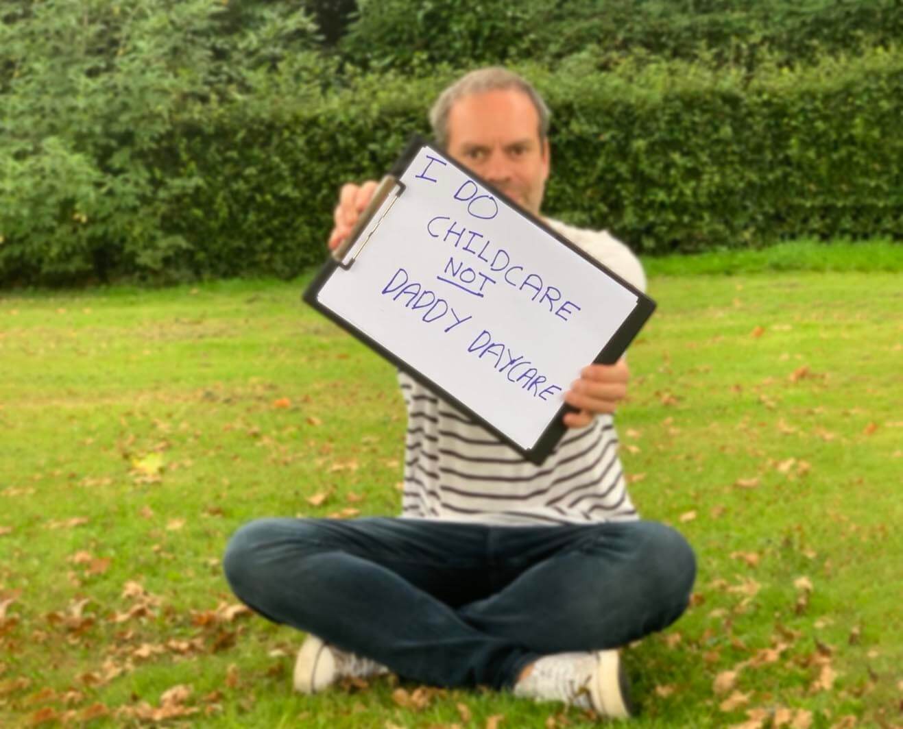 Man holding sign supporting HeForShe I Do campaign